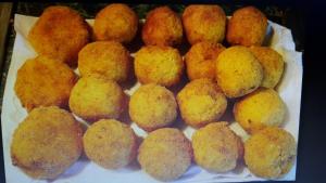 a bunch of muffins sitting on a plate at Villa Salvatore in San Leone