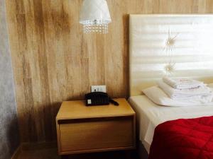 Posteľ alebo postele v izbe v ubytovaní Fanari Hotel