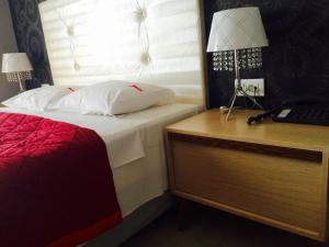 Posteľ alebo postele v izbe v ubytovaní Fanari Hotel