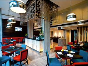 Posezení v ubytování FX Hotel Metrolink Makkasan