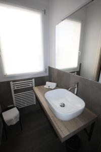 Koupelna v ubytování Pove 2.4 Hotel