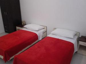 Posteľ alebo postele v izbe v ubytovaní Apartman Vlado