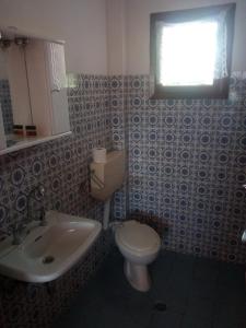 Ванная комната в Pension Olympus