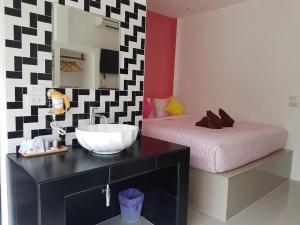 Postel nebo postele na pokoji v ubytování Phannarai House