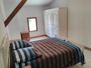 Ένα ή περισσότερα κρεβάτια σε δωμάτιο στο Grès Vaillant