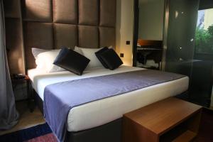 Voodi või voodid majutusasutuse Triviho Hotel toas
