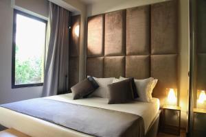 Voodi või voodid majutusasutuse Triviho Hotel toas