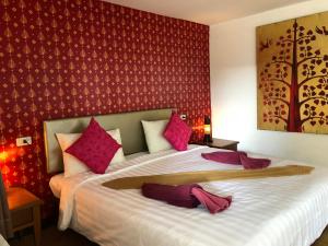 Krevet ili kreveti u jedinici u okviru objekta Paradise Resort Phi Phi