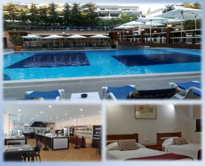 uma grande piscina num hotel em Apartamentos da Balaia em Albufeira