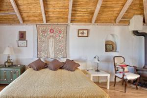 Posteľ alebo postele v izbe v ubytovaní La Casa de Bovedas Charming Inn
