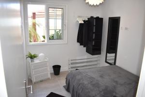 Postel nebo postele na pokoji v ubytování Komfort Wellness Haus Mesa del Mar