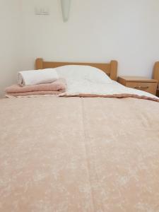 Cama ou camas em um quarto em Guest House Plitvicki Emaus