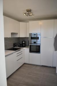 Kuchyň nebo kuchyňský kout v ubytování Komfort Wellness Haus Mesa del Mar