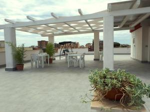 A balcony or terrace at Guest House Roma Express