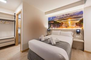 Postel nebo postele na pokoji v ubytování Atotxa Rooms