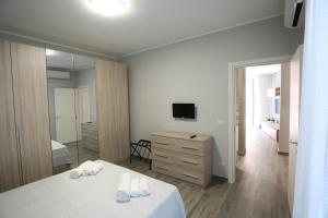 Postel nebo postele na pokoji v ubytování SIROIKIA luxury apartments