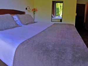 Ein Bett oder Betten in einem Zimmer der Unterkunft Hotel Pucon Green Park