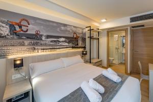 Postel nebo postele na pokoji v ubytování Atotxa Rooms