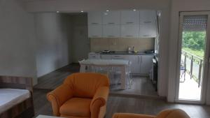 Kuchyň nebo kuchyňský kout v ubytování Apartments Struga