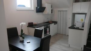 Kuchyňa alebo kuchynka v ubytovaní Antonio Appartement
