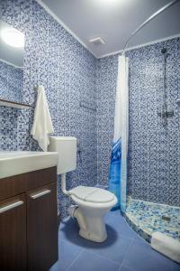 Koupelna v ubytování Andreea Residence Mamaia Nord