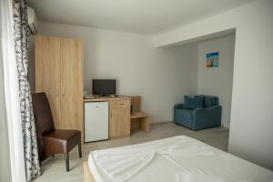 TV a/nebo společenská místnost v ubytování Andreea Residence Mamaia Nord