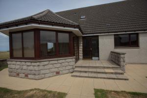 a rendering of a house with a porch at GOLFVIEW 4 in Buckie