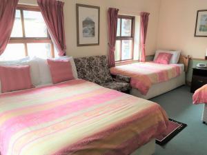 Postel nebo postele na pokoji v ubytování O'Connors Guesthouse