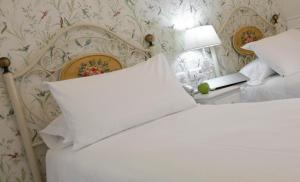 Cama o camas de una habitación en Basic Hotel Puerta de Sevilla