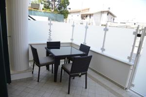 A balcony or terrace at Tempo Di Sole con Serv Spiaggia