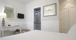 Cama o camas de una habitación en Basic Hotel Puerta de Sevilla