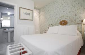 Cama o camas de una habitación en Basic Hotel Puerta de Sevilla