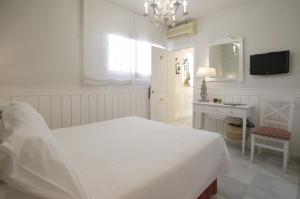 Cama o camas de una habitación en Basic Hotel Puerta de Sevilla