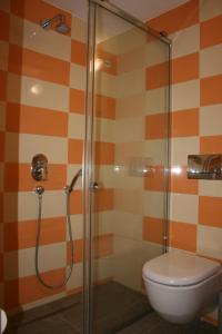 Koupelna v ubytování Metaxa Hotel