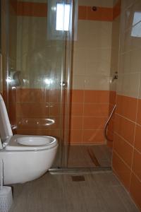 Koupelna v ubytování Metaxa Hotel