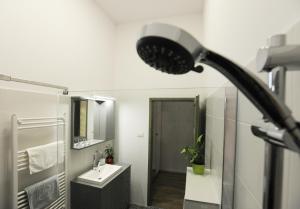Kúpeľňa v ubytovaní M37 Apartman