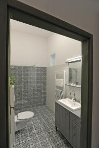 Kúpeľňa v ubytovaní M37 Apartman