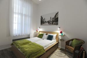 Posteľ alebo postele v izbe v ubytovaní M37 Apartman