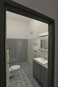 Kúpeľňa v ubytovaní M37 Apartman