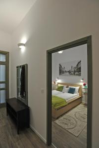Posteľ alebo postele v izbe v ubytovaní M37 Apartman