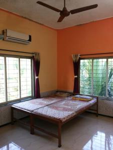 Postel nebo postele na pokoji v ubytování Greenveela Resort