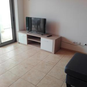 Televízia a/alebo spoločenská miestnosť v ubytovaní Mar Atlantico Apartment