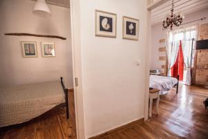 Postel nebo postele na pokoji v ubytování Green Door Apartment