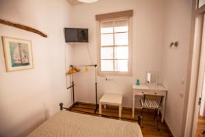 Postel nebo postele na pokoji v ubytování Green Door Apartment