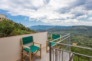 En balkon eller terrasse på Casa Bea Bosa/Magomadas