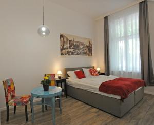 Posteľ alebo postele v izbe v ubytovaní M37 Apartman