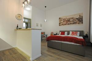 Posteľ alebo postele v izbe v ubytovaní M37 Apartman