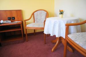 Postel nebo postele na pokoji v ubytování Hotel Pesterwitzer Siegel