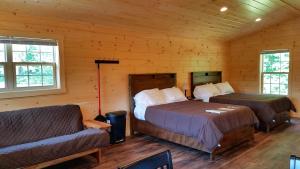 Llit o llits en una habitació de Abbot Trailside Lodging