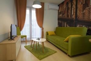 Posezení v ubytování Flatiron Apartments Skopje